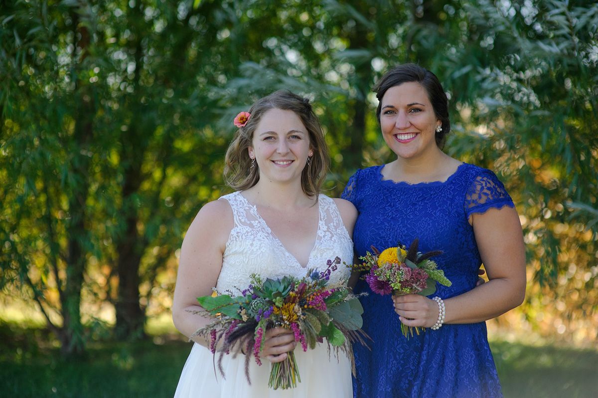 sutliff cider wedding - bride and bridesmaid